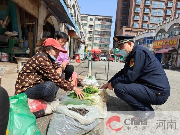 确山县城管局：实施柔性执法彰显“城管温度”